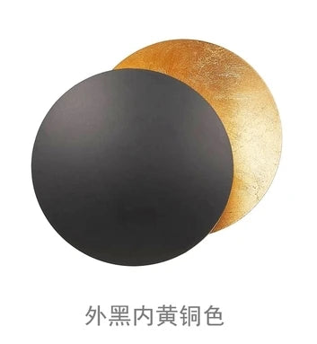 Détail de la finition cuivre doré plaqué de l'applique lune éclipse
