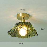 Suspension fleur vintage verre coloré E27, détail du diffuseur lumineux jeu de lumière naturel