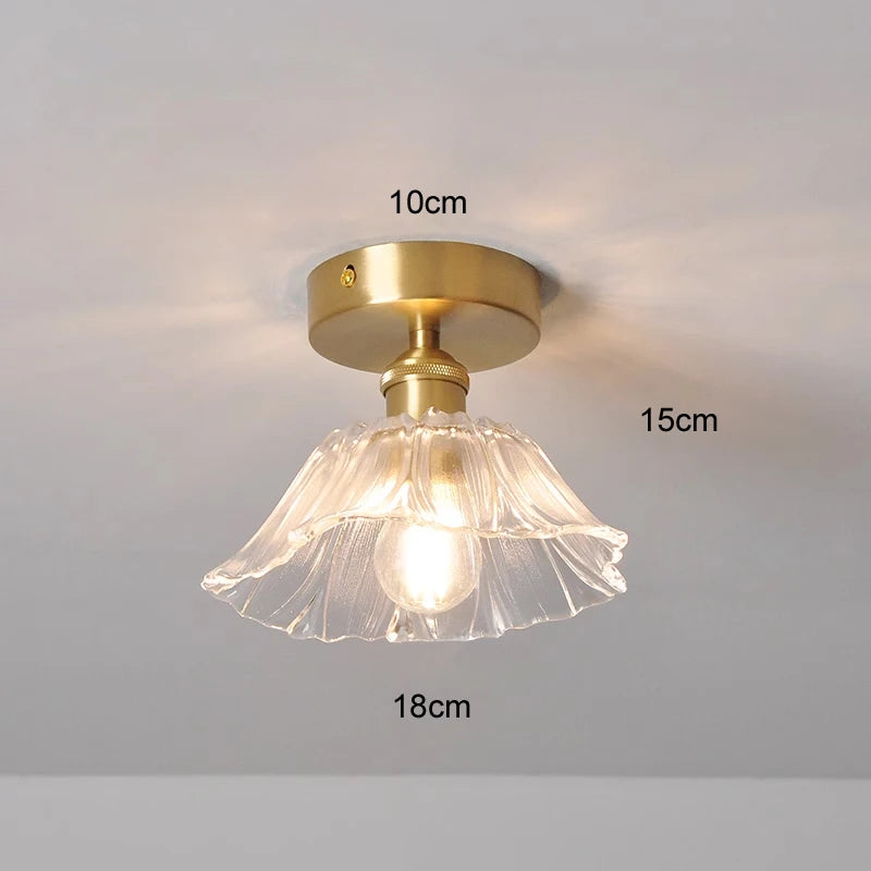 Suspension fleur vintage verre coloré E27, vue détaillée de la connectique jeu de lumière naturel