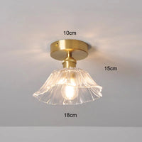 Suspension fleur vintage verre coloré E27, vue détaillée de la connectique jeu de lumière naturel