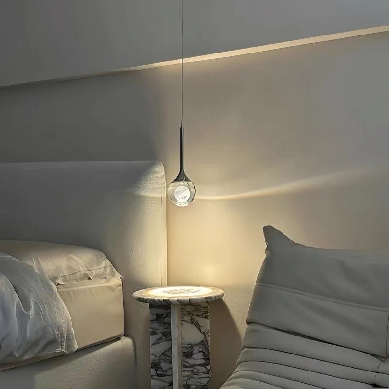 Suspension luxe créative G9, ambiance soir au-dessus d'une table ambiance chaleureuse