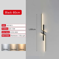 Applique murale LED dorée forme C 80 cm, vue frontale allumée