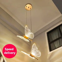 Suspension papillon LED 1 branche en blanc chaud, ambiance chevet