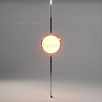 Lampadaire doré boule ambrée 160 cm, ambiance lounge feutrée