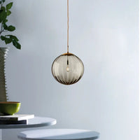 Suspension boule verre marron 15 cm en chambre cocooning