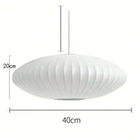 Suspension soie italienne E27 30-50 cm salon, vue d'ensemble du luminaire allumé jeu de lumière naturel