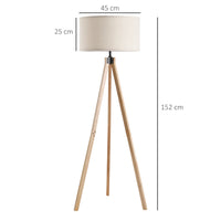 Lampadaire trépied scandinave bois E27 40 W beige, vue trois quarts du luminaire éteint jeu de lumière naturel