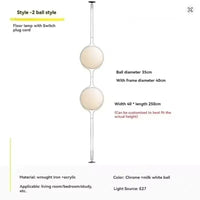 Lampadaire design boule blanche éteint, vue frontale minimaliste