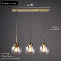 Vue trois quarts de la suspension verre soufflé luxe E27 dorée