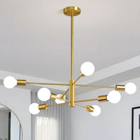 Lustre moderne 12 branches doré dans un salon contemporain lumineux