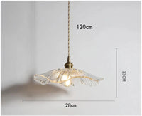 Suspension fleur vintage verre coloré E27, détail de la finition et du matériau jeu de lumière naturel