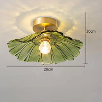 Suspension fleur vintage verre coloré E27, vue trois quarts du luminaire éteint ambiance chaleureuse