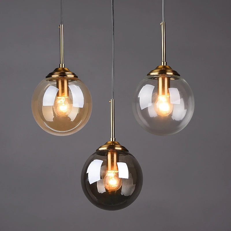 Suspension verre soufflé transparent E27, salle à manger moderne épurée