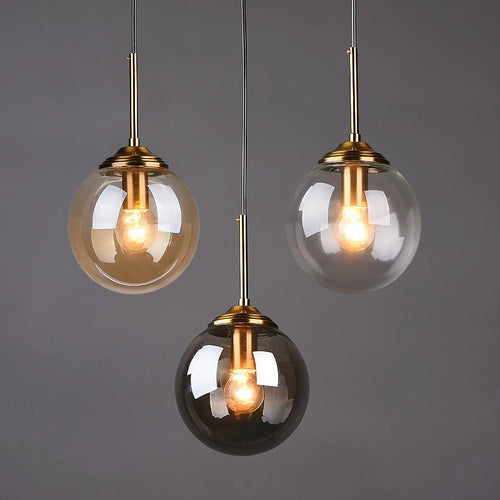 Suspension verre soufflé transparent E27, salle à manger moderne épurée