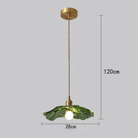Suspension fleur vintage verre coloré E27, ambiance soir au-dessus d'une table