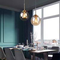 Détail du diffuseur verre soufflé, suspension E27 finition acier poli