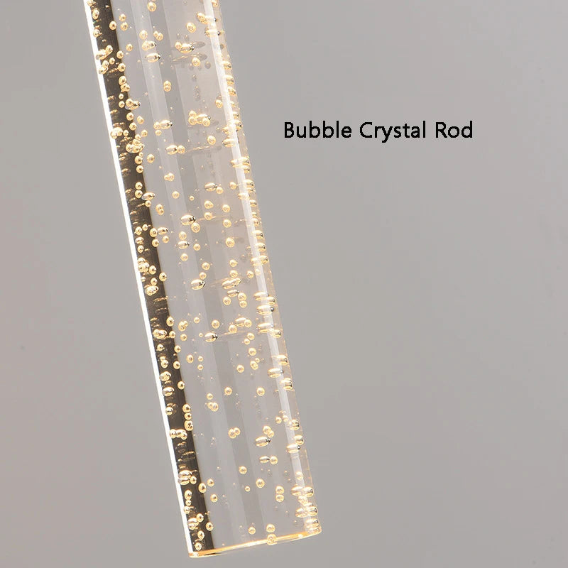 Applique murale cristal LED, vue trois quarts du luminaire éteint jeu de lumière naturel