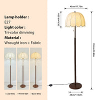 Lampadaire LED col de cygne tissu E27 ajustable, installé en chambre cosy ambiance chaleureuse