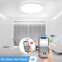 Plafonnier LED rond, vue trois quarts du luminaire éteint jeu de lumière naturel