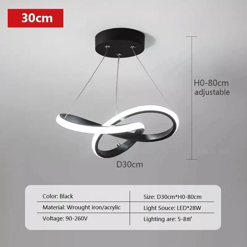 Suspension LED ronde blanche 24 cm dans un coin lecture cosy