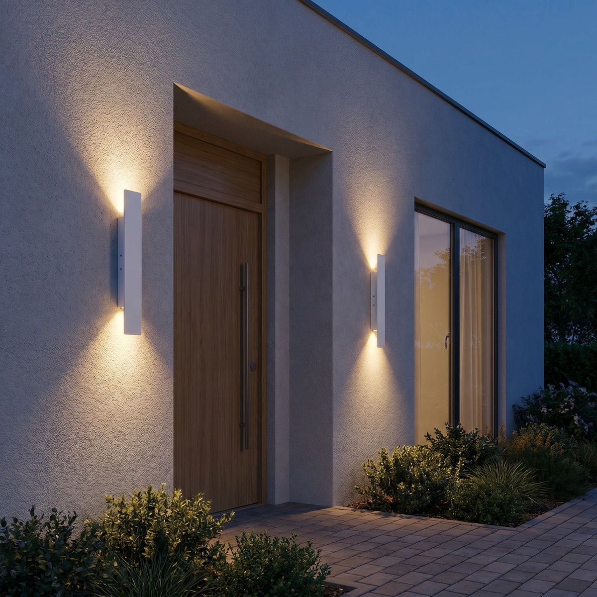 Applique murale extérieure LED IP65 coloris blanc, à l'extérieur au crépuscule, allumée