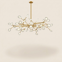 Lustre Lucioles Doré modèle B 54 branches sur fond beige